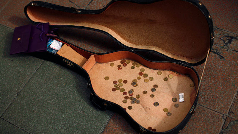 Three police officers suspended after blind busker assault