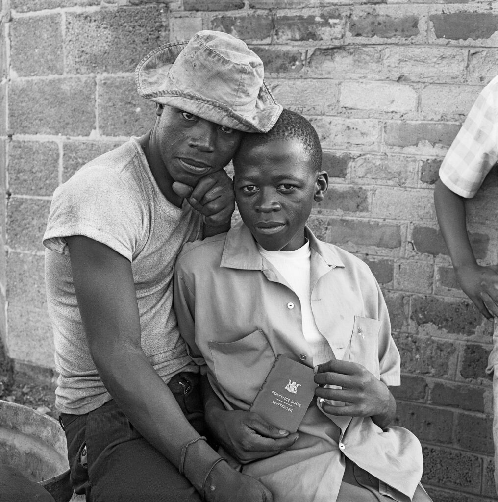 Young men with dompas an Identity document every African had to carry, White City, Jabavu, Soweto, 1972