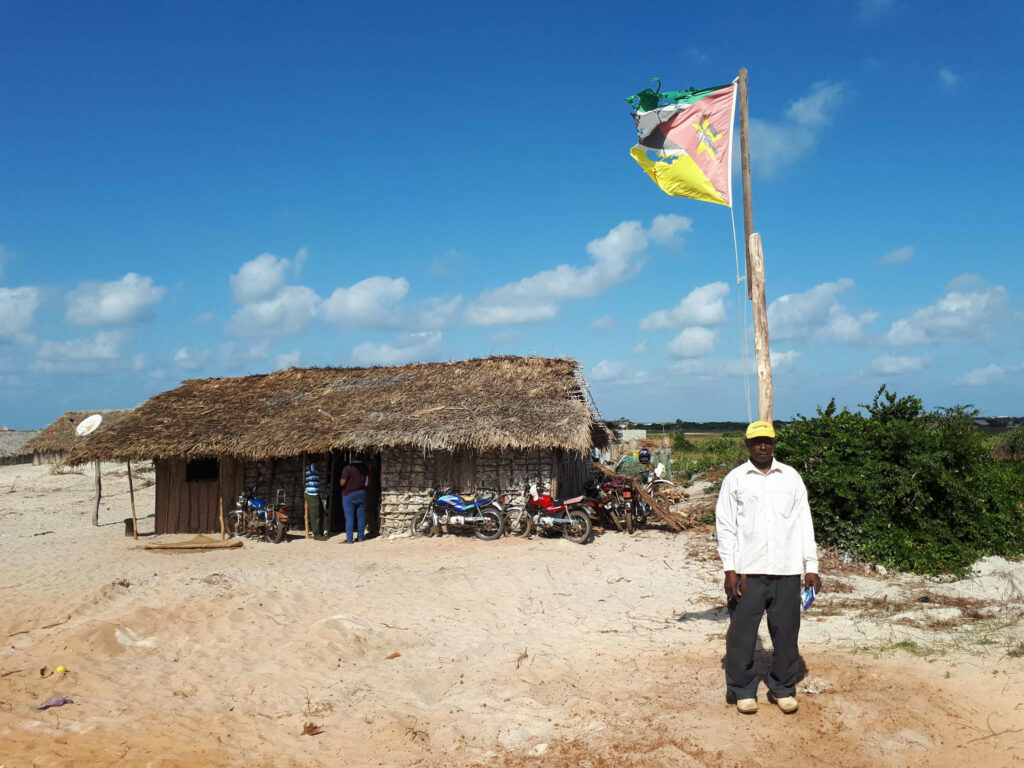 Displaced: Nassire Omar had to rebuild his shop after flooding forced villagers to move. Amnesty International