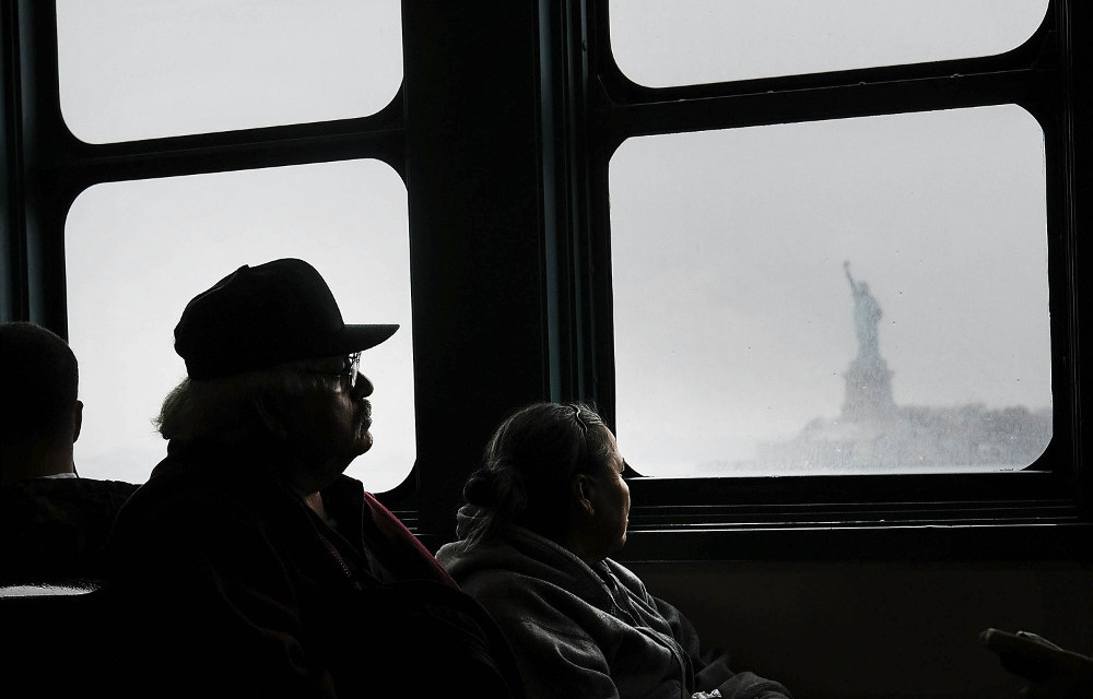 Some American citizens are now contemplating the Statue of Liberty