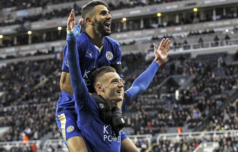 Jamie Vardy celebrates with Riyad Mahrez after scoring the first goal for Leicester against Newcastle at St James' Park on November 21 last year.