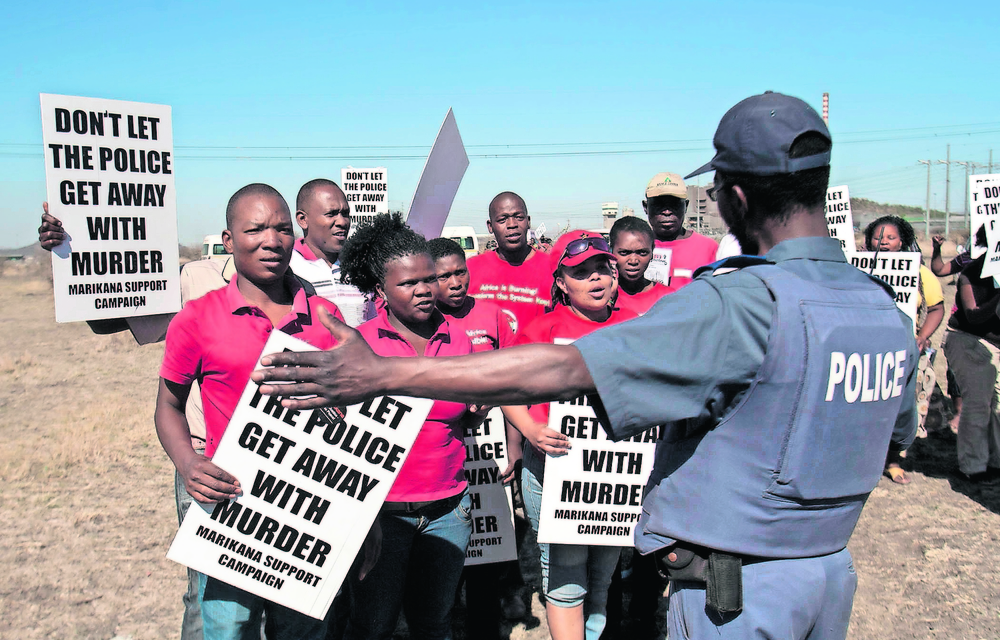 Death’s hill: Protesters were present on the day the Farlam Commission of Inquiry inspected the koppie at Marikana where 34 miners shot by police. Photo: Delwyn Verasamy Picture: Delwyn Verasamy