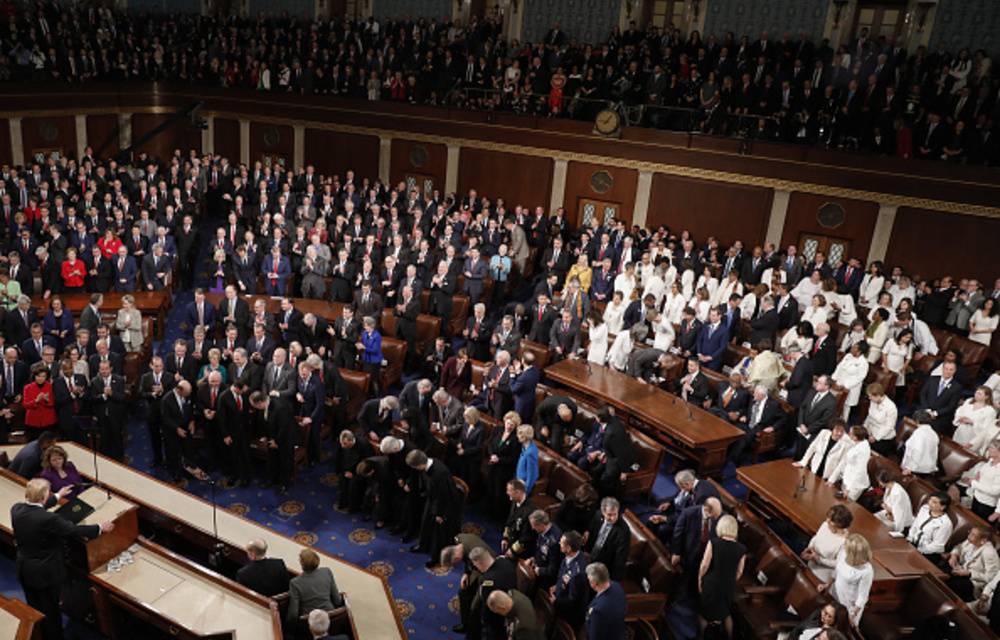 Democrat women in solidarity at Trump address