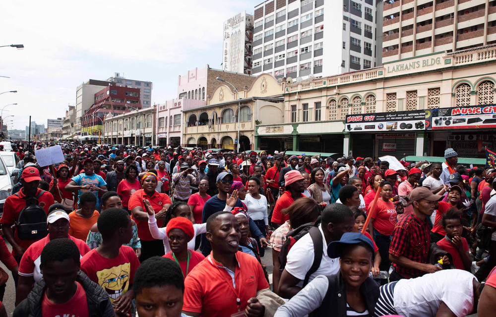 Abahlali members take to the streets under heavy police presence. Durban CBD came to a standstill on Monday as thousands of Abahlali BaseMjondolo members marched its streets protesting against political motivated killings.