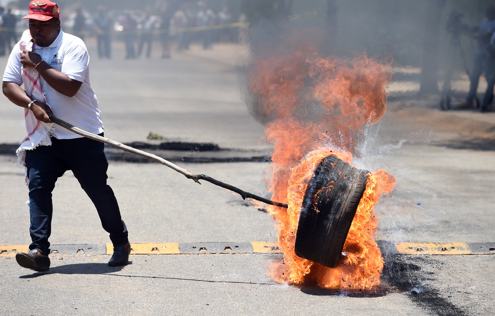 The Economic Freedom Fighters leader Julius Malema urges protesters outside the Union Buildings to stop Mantashing