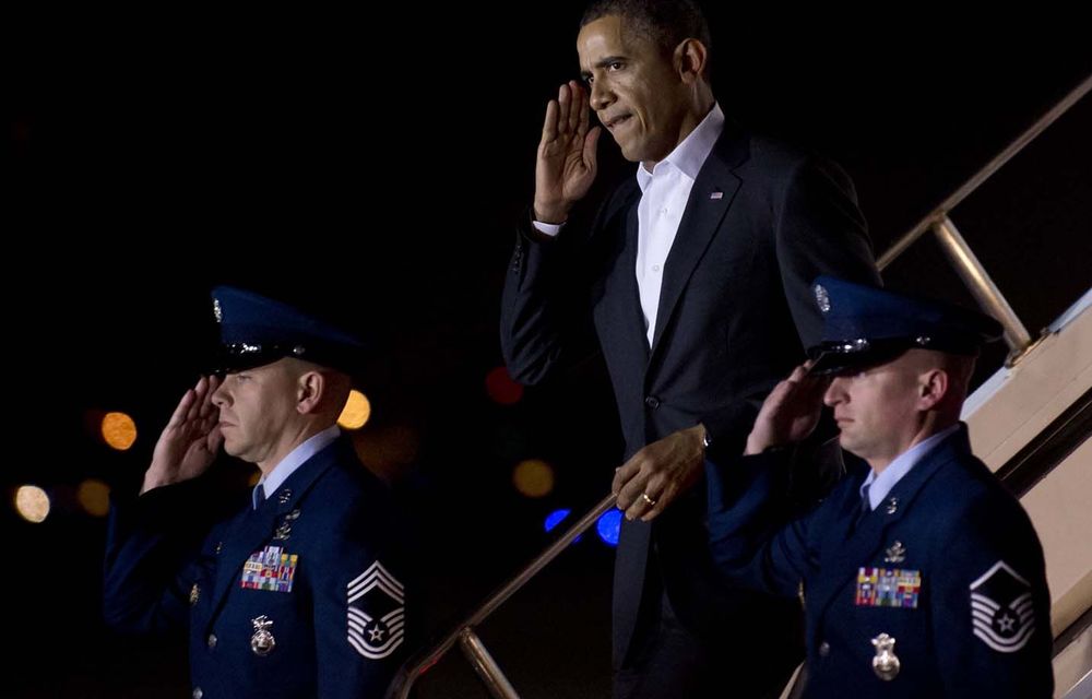 Obama told Hyde Park Academy students in their navy uniform shirts