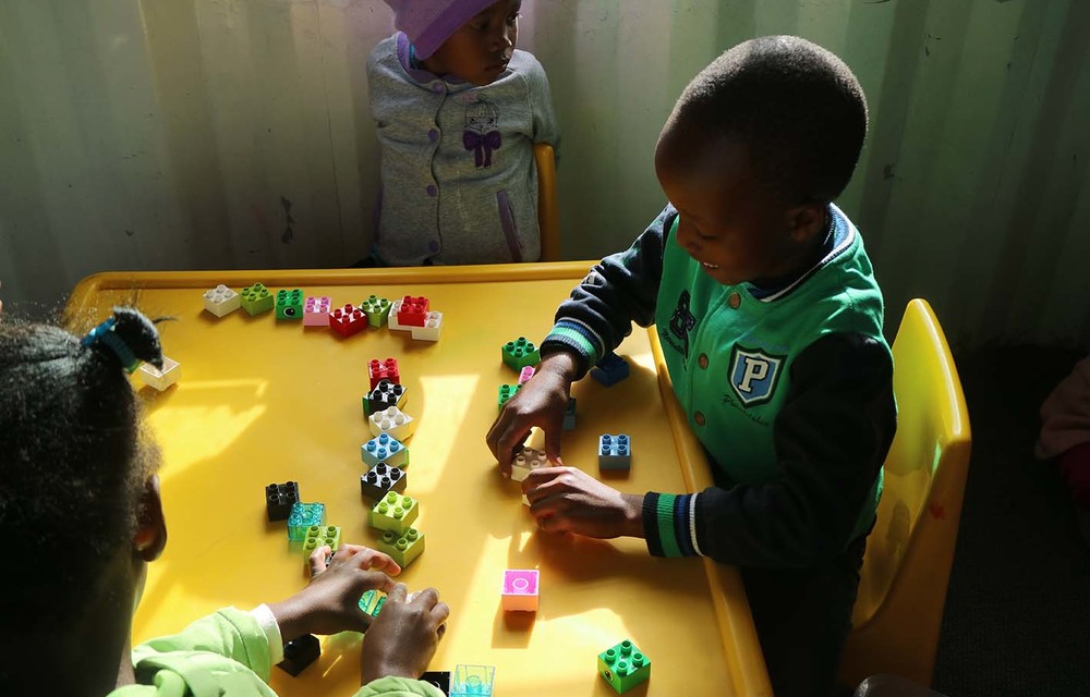 Words and play: Building block for language