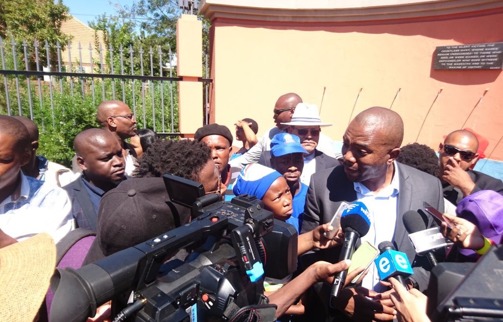 Mmusi Maimane speaks to journalists and residents in Sharpville on Human Rights Day.