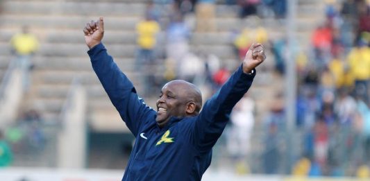 Pitso Mosimane celebrates during the Absa Premiership match between Mamelodi Sundowns and Platinum Stars at Lucas Moripe Stadium in May.