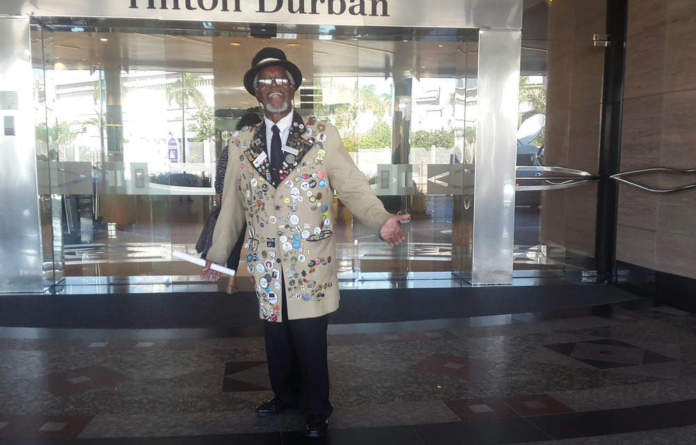 Obed Mbatha with his colourful jacket at the entrance to the Hilton Durban.