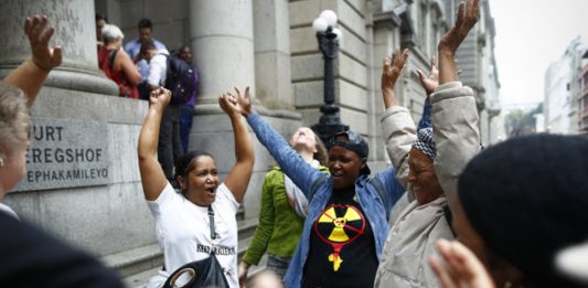 Celebrations outside the Western Cape High Court after it ruled against the South African government’s proposed nuclear deal.