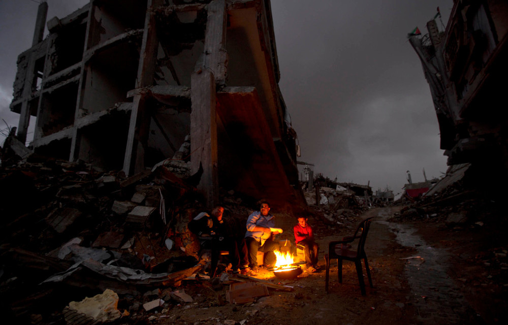 Protection: Gaza City during the 50-day war in 2014 with Israel. Palestinians have turned to the International Criminal Court to hold Israel to account for war crimes and human rights violations. Photo: Mahmud Hams/AFP