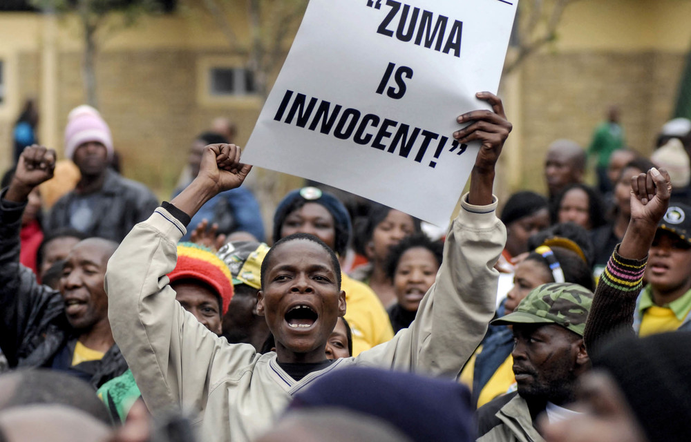 Jacob Zuma supporters celebrate after a court threw out his corruption case in 2008. The reinstatement of the charges may be used as leverage to edge Zuma out of power.