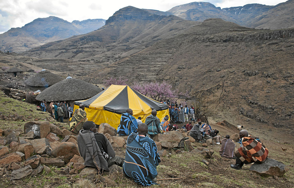 Mineworkers attend a funeral in Semonkong