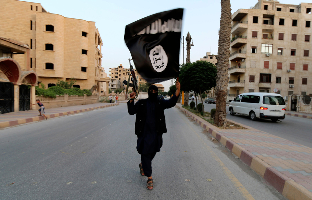 A member loyal to the Islamic State in Iraq and the Levant