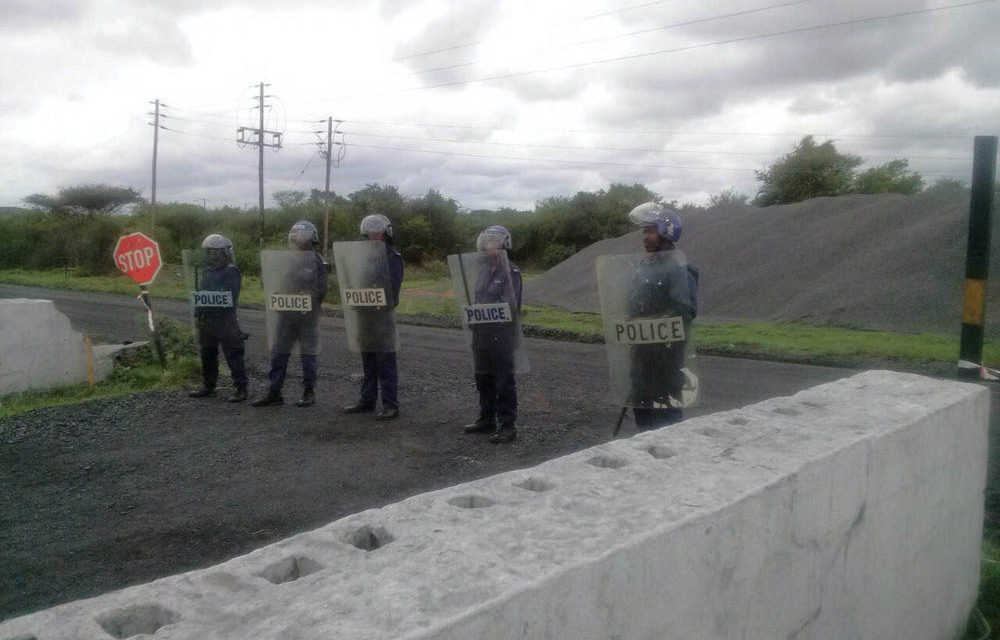 Police at the Maloma colliery.