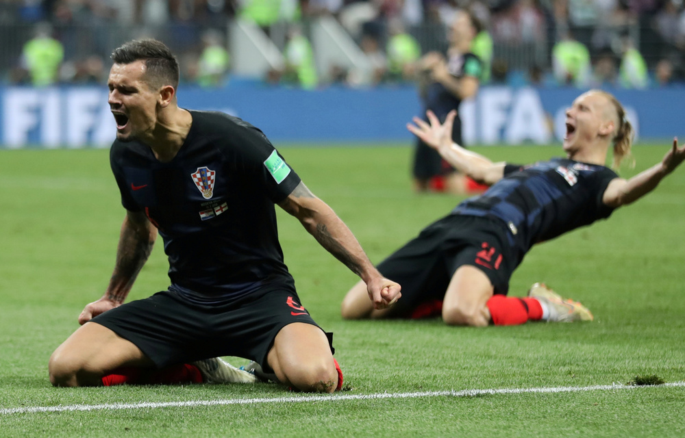 Croatia's Dejan Lovren and Domagoj Vida celebrate after the match