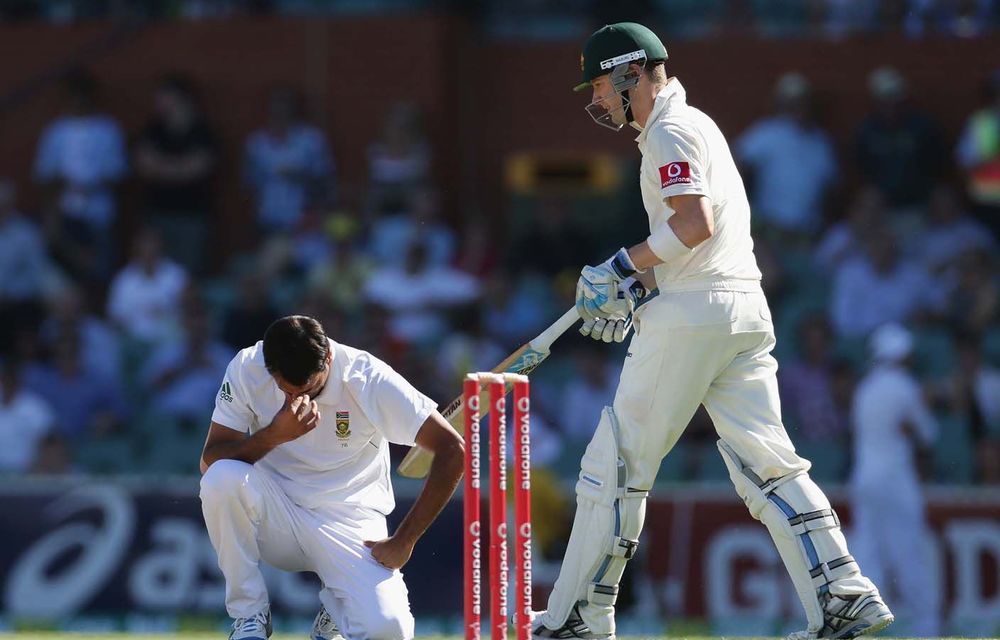 Imran Tahir contemplates another boundary by Australia's prolific Michael Clarke on the first day of the second Test in Adelaide.