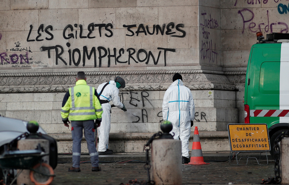 "The yellow vests will triumph" is seen written on the Arc de Triomphe