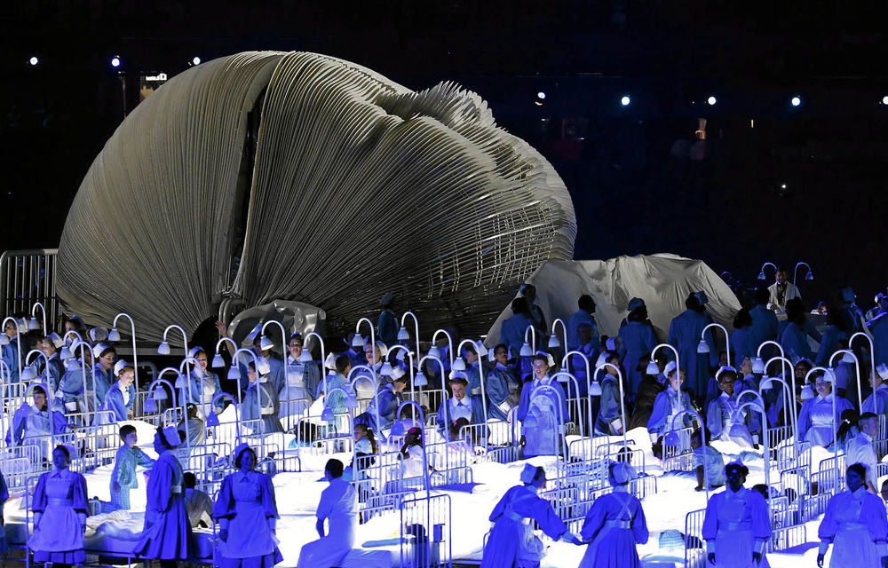 Actors perform in a sequence meant to represent Britain's National Health Service during the 1950s at the opening ceremony of the 2012 Summer Olympics.