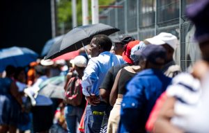 Social standing: Grant beneficiaries queuing to collect their money in Alexandra