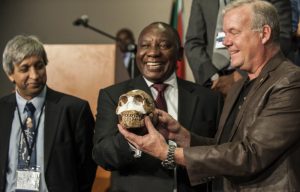 Deputy President Cyril Ramaphosa and Professor Lee Berger hold a replica of the skull of a Homo naledi during the unveiling of the discovery.