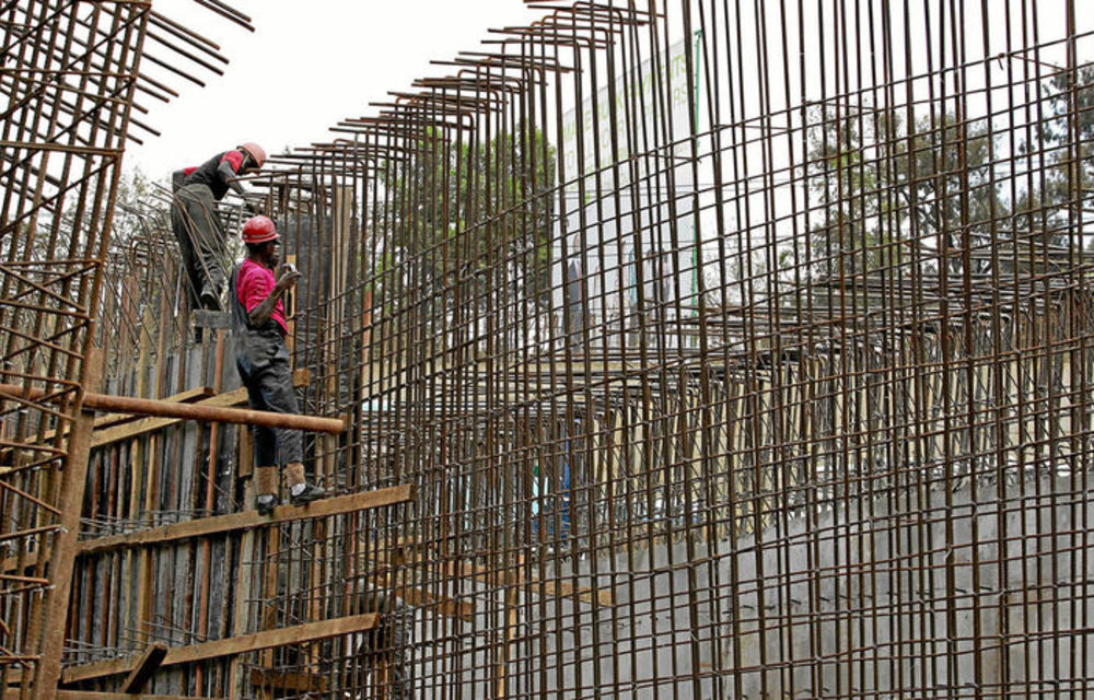 Workers erect a bridge in Nairobi as part of a project that is funded by the governments of Kenya and China and the African Development Bank.