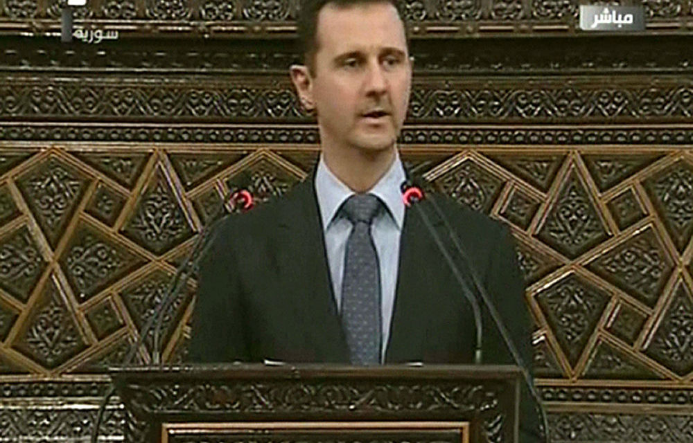 Syrian President Bashar al-Assad addresses Parliament earlier this month.