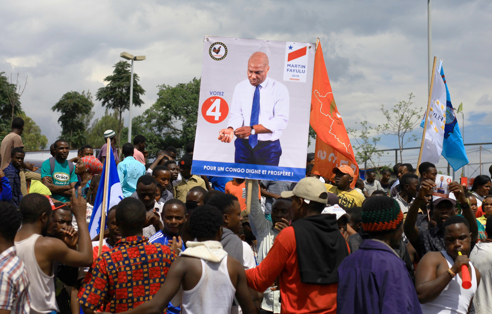 Supporters of Congolese joint opposition presidential candidate Martin Fayulu gather as he campaigns in Goma