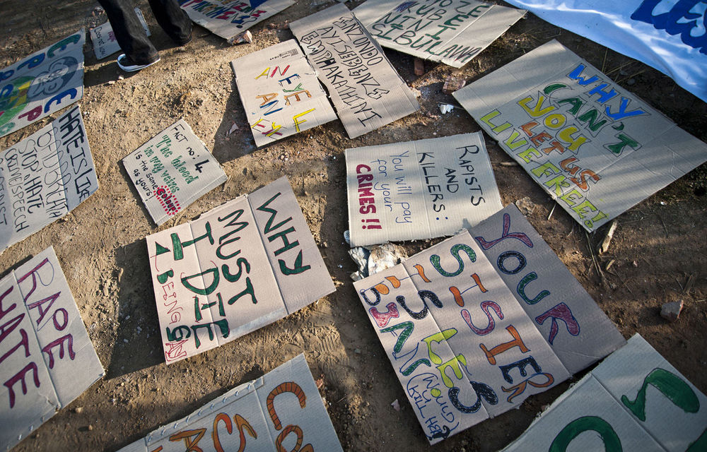 Posters describe mourners' sentiments after the murder of lesbian Noxolo Nogwaza in KwaThema