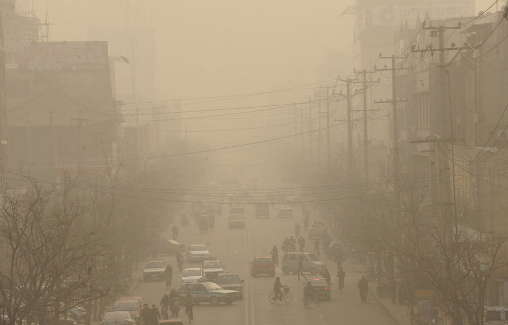 Smog weighs down city life on a main street of Linfen