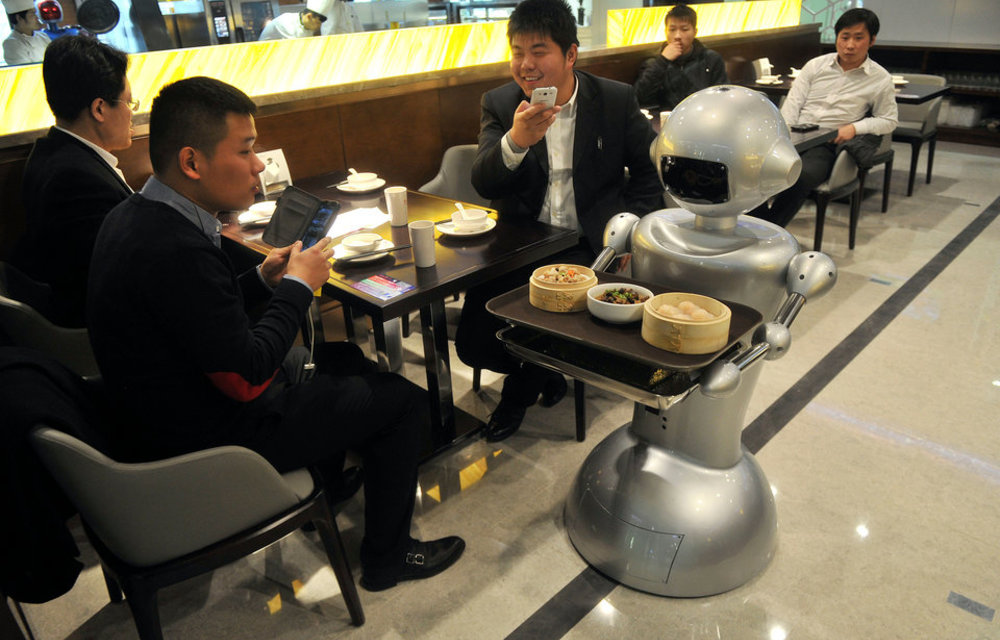 Chip labour: Robots replace waiters in restaurant