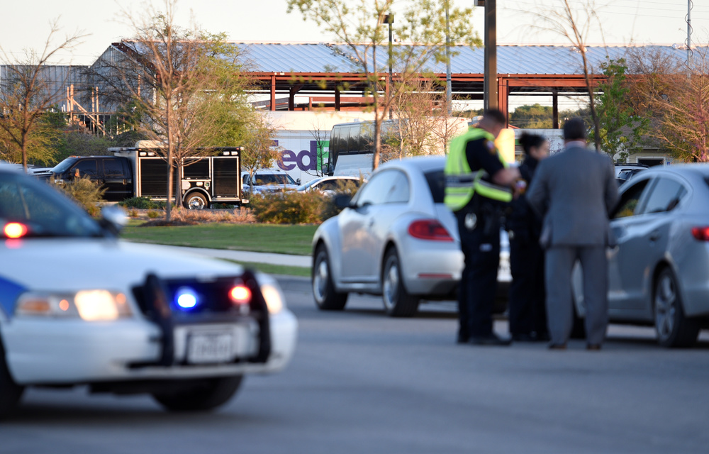 Schertz Police block off Doerr Lane near the scene of a blast at a FedEx facility in Schertz