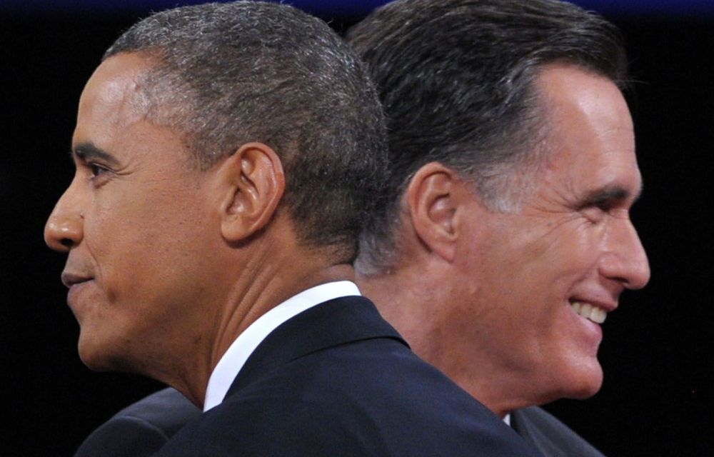 Barack Obama greets Republican presidential candidate Mitt Romney following the third and final presidential debate at Lynn University in Boca Raton