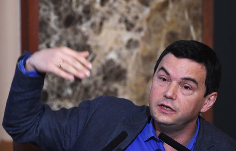 Economist Thomas Piketty answers a question during his press conference at Japan National Press Club in Tokyo on January 31 2015.