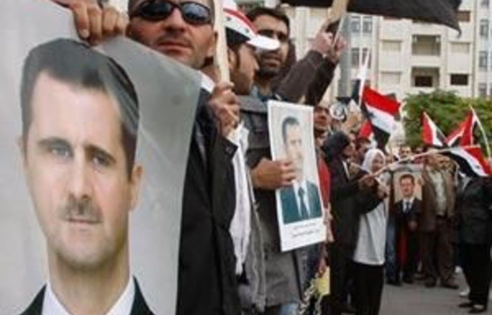 Syrians rally against Arab League sanctions