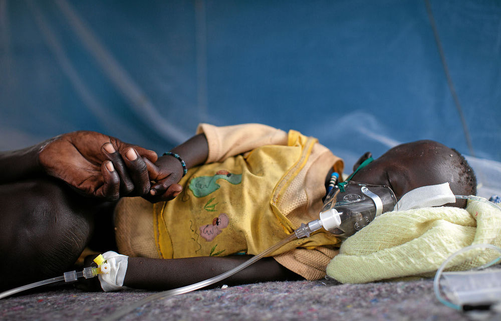 Lastman Muthko lies at a Médecins Sans Frontières hospital in the Upper Nile in South Sudan in July.