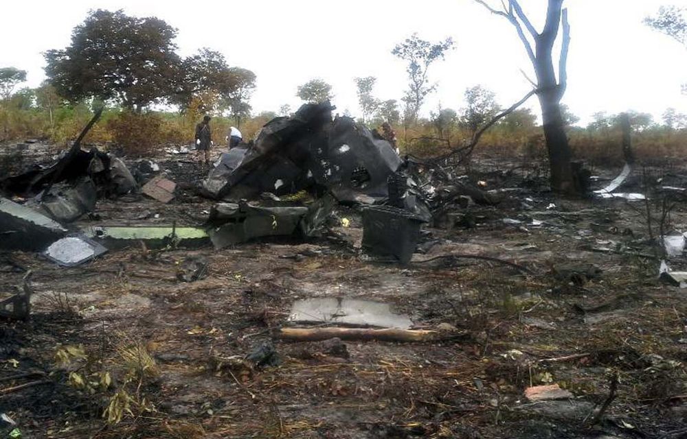 A handout picture released by the Namibian police shows the burnt wreckage of a Mozambican Airlines plane at the site of its crash in Namibia's Bwabwata National Park on November 30.