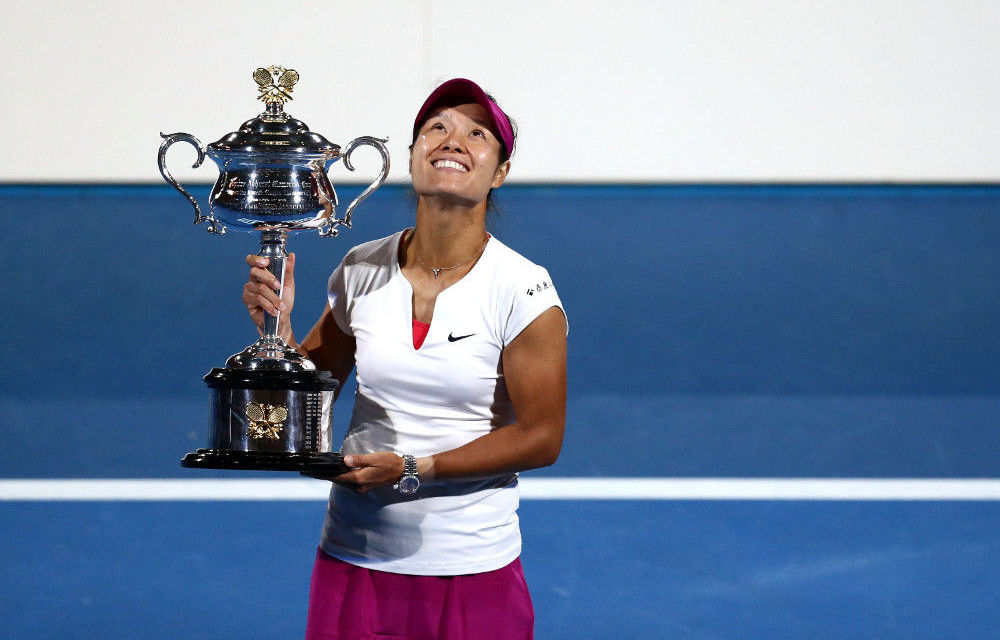 Na Li of China holds the Daphne Akhurst Memorial Cup after winning the Australian Open women's final against Dominika Cibulkova of Slovakia.