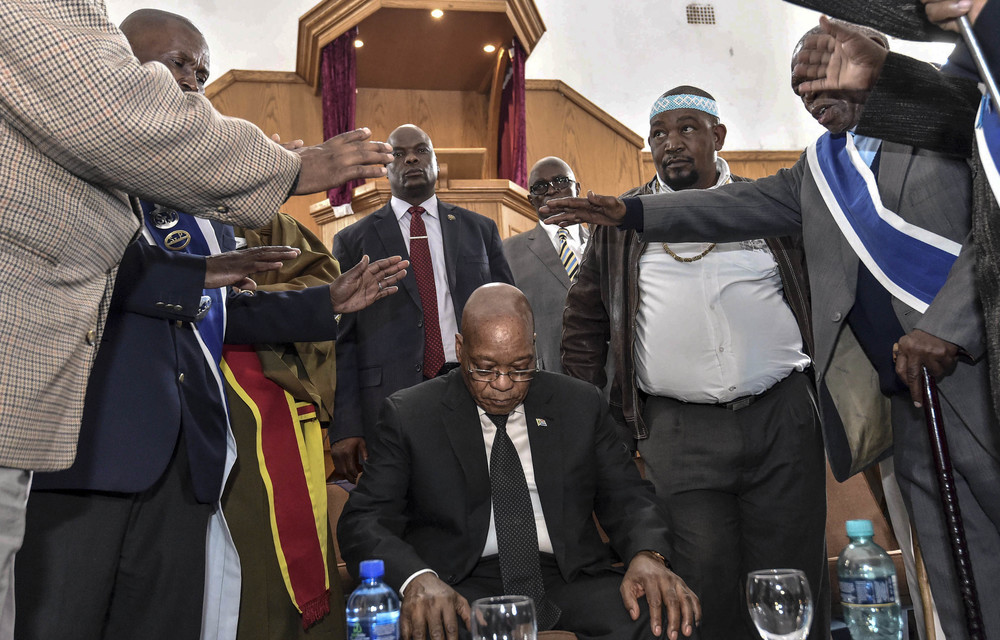 Be done: Leaders of St John’s Apostolic Faith Mission praying over Jacob Zuma in August last year. Will they still?