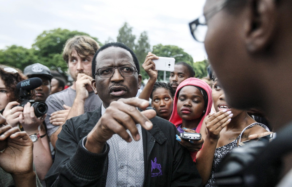 Unresolved: Rhodes vice-chancellor Sizwe Mabizela speaks to students protesting against sexual violence in 2016