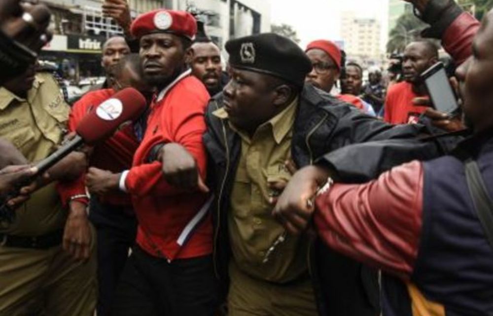 Poor man’s hero: Musician-turned-politician Robert Kyagulanyi is arrested by police during a demonstration in July in Kampala against a new tax on social media use.