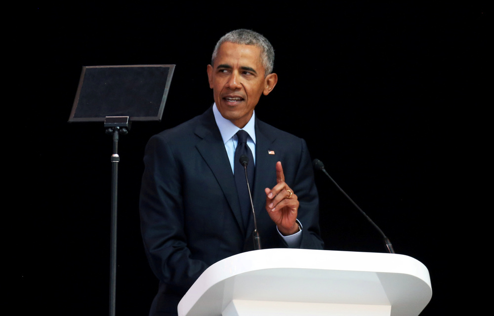 Obama warns of ‘strange and uncertain times’ in Mandela tribute