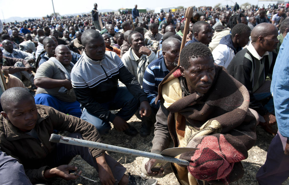 Both NUM and Amcu have denied being behind the deadly protests at Lonimn mines.