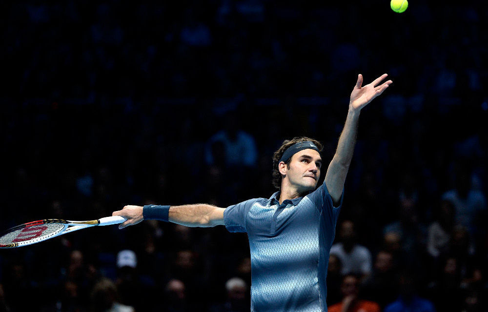 Roger Federer serves to Rafael Nadal during the semi-final of the ATP World Tour Finals at the O2 Arena in London on November 10 2013.