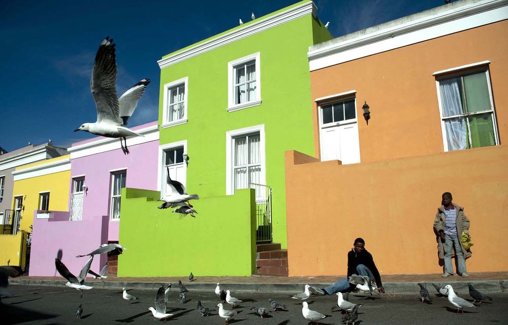 A family outside its Wale Street home in the Bo-Kaap