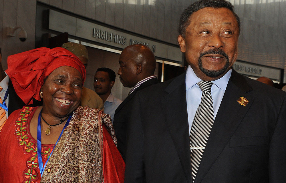 Nkosazana Dlamini-Zuma is congratulated by her predecessor Jean Ping as they leave the meeting during the 19 African Union Summit in Addis Ababa.