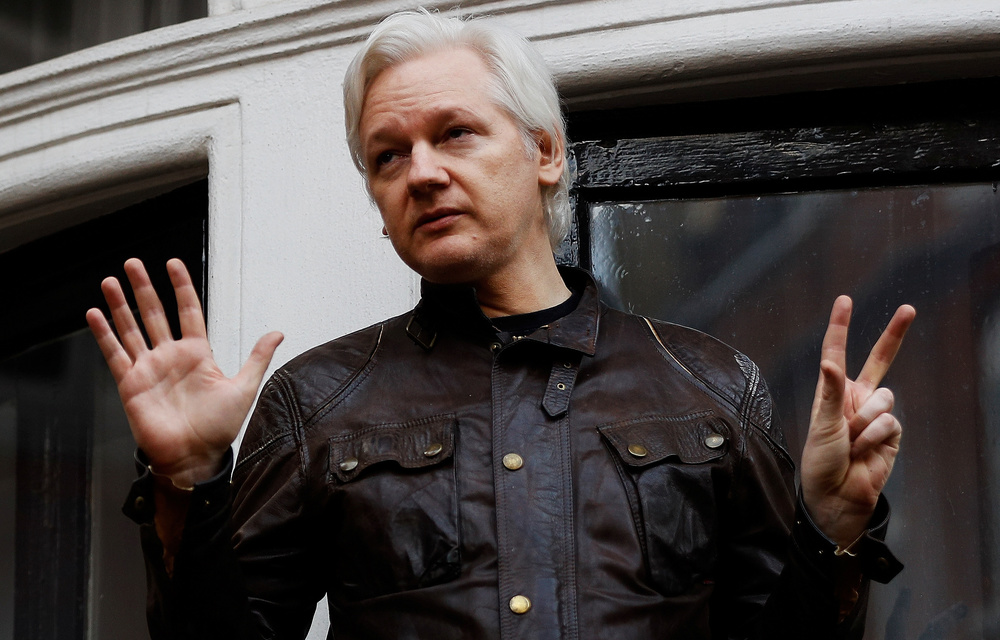 WikiLeaks founder Julian Assange is seen on the balcony of the Ecuadorian Embassy in London in 2017.