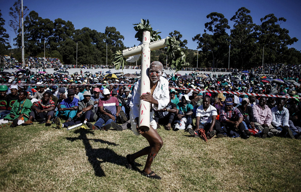 Bargaining season: Amcu members at the Masizakhele Stadium in Driefontein during the gold sector strike earlier this year. Platinum companies are hoping their negotiations proceed more smoothly.