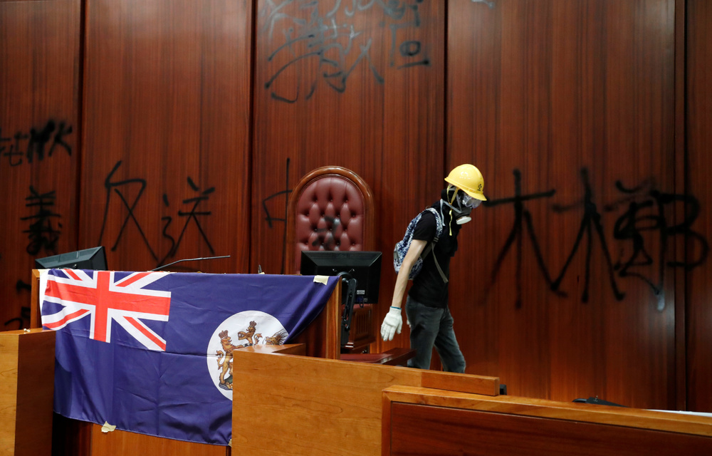 The colonial flag of Hong Kong is displayed inside a chamber after protesters broke into the legislative council building during the anniversary of Hong Kong's handover to China in Hong Kong